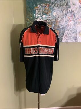 Harley Davidson golf style shirt in size L.